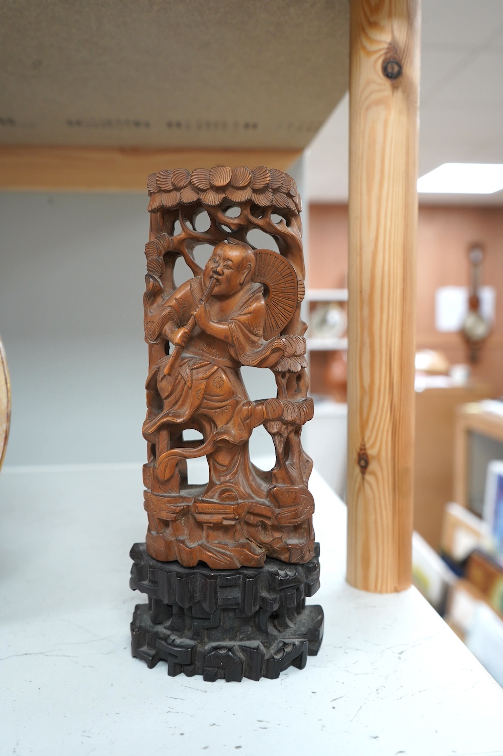 An early 20th century Chinese bamboo carving of an immortal, 23cm. Condition - fair to good